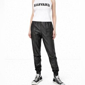 Spanx faux leather joggers in black with elastic waistband. M